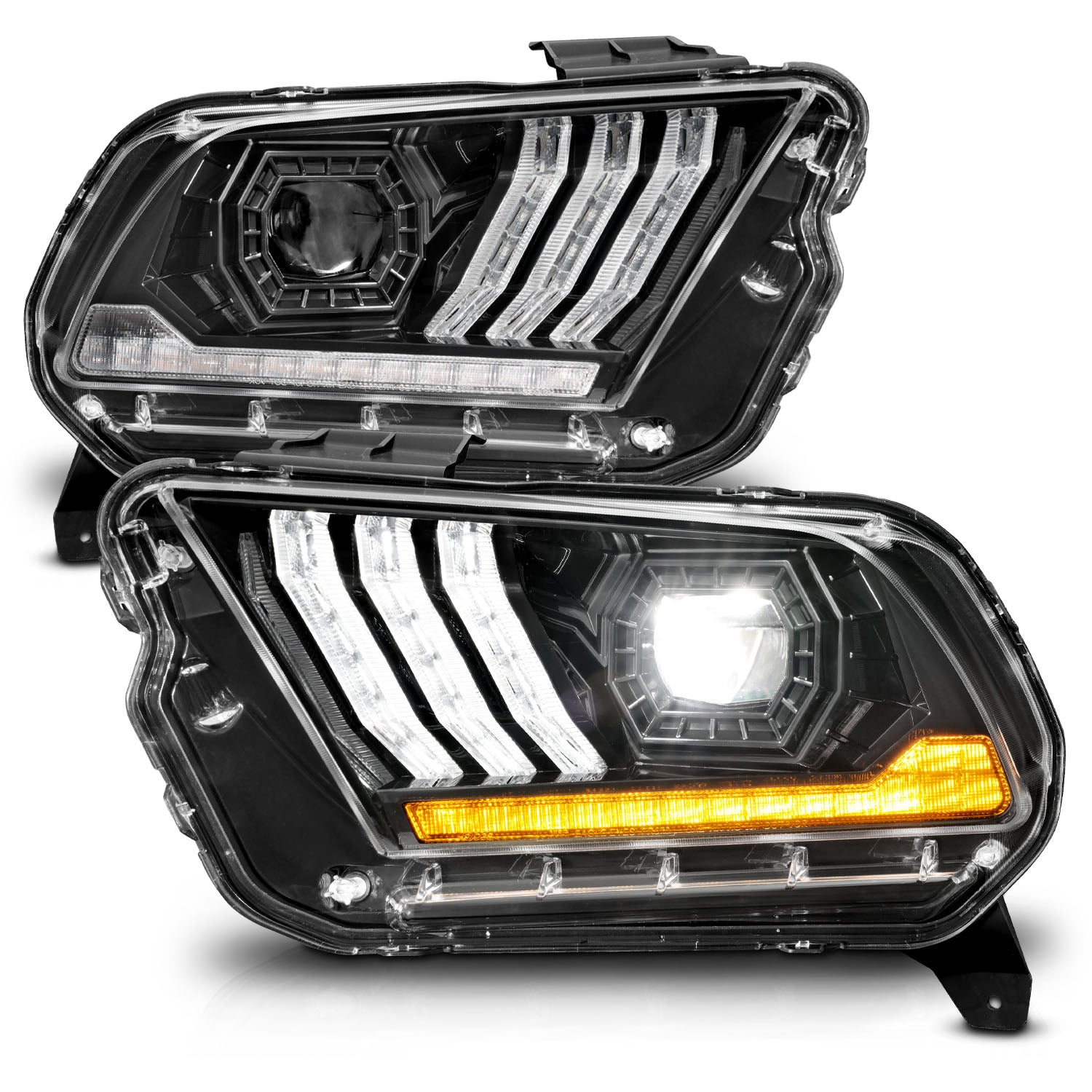 Pair of car headlights with clear lens on a white background