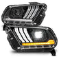 Pair of car headlights with clear lens on a white background