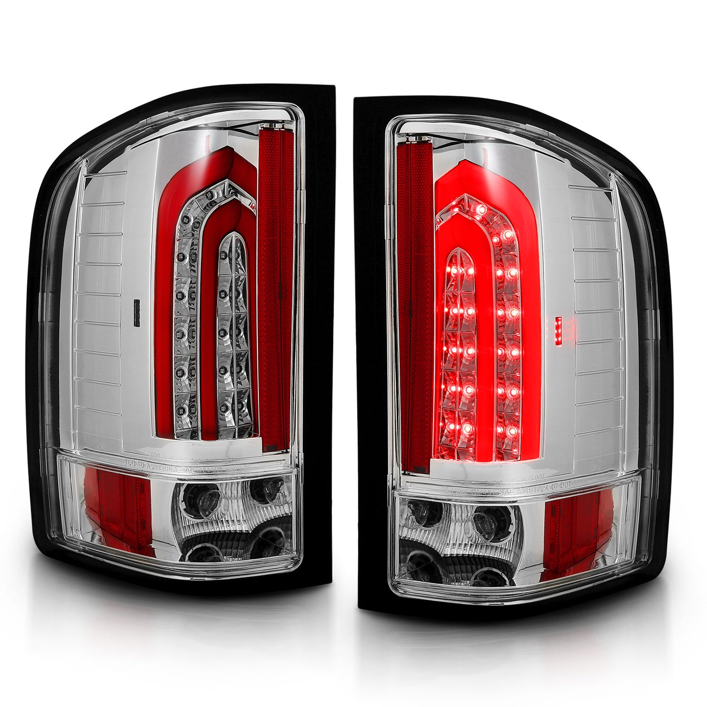 Pair of red and clear tail lights on a white background