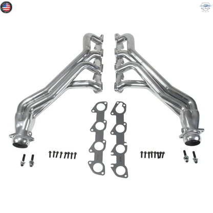 Metal exhaust pipes with gaskets and bolts on a white background