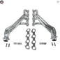 Metal exhaust pipes with gaskets and bolts on a white background