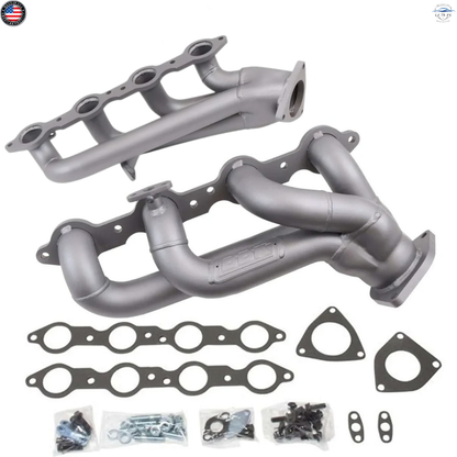 Metal exhaust manifold set with gaskets and bolts on a white background