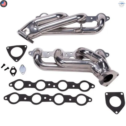 Metal exhaust manifold set with gaskets on a white background
