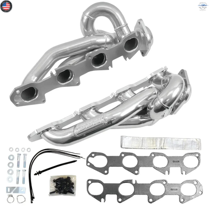 Car exhaust manifold kit with gaskets and hardware on a white background