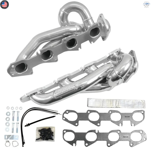 Car exhaust manifold kit with gaskets and hardware on a white background