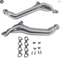 Metal exhaust pipes with gaskets and bolts on a white background