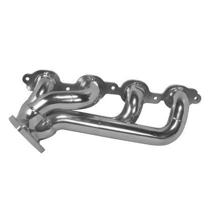 Metallic exhaust manifold on a white background