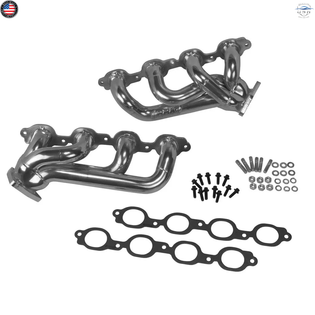 Metal exhaust manifold set with gaskets and bolts on a white background